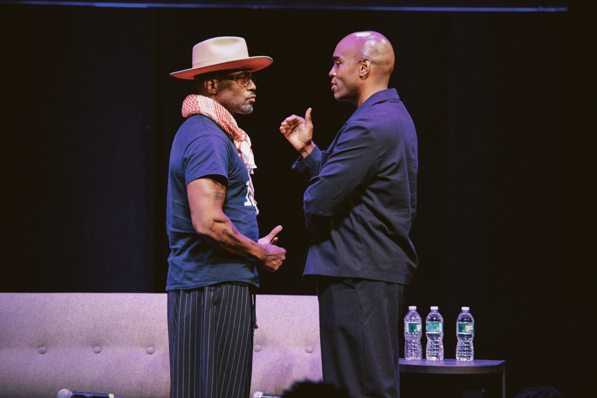 Two speakers facing each other in conversation on stage at ViewerCon 2026